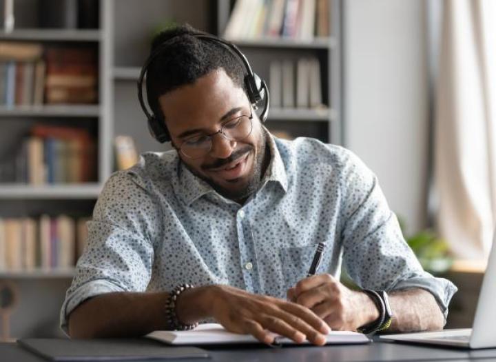 A man studying with laptop