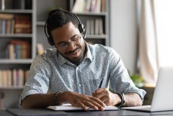A man studying with laptop