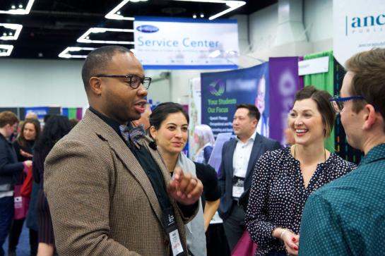 Several people meeting at an expo