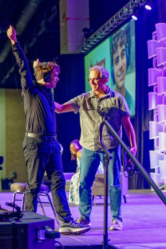 Zach Laviola arms raised victoriously 